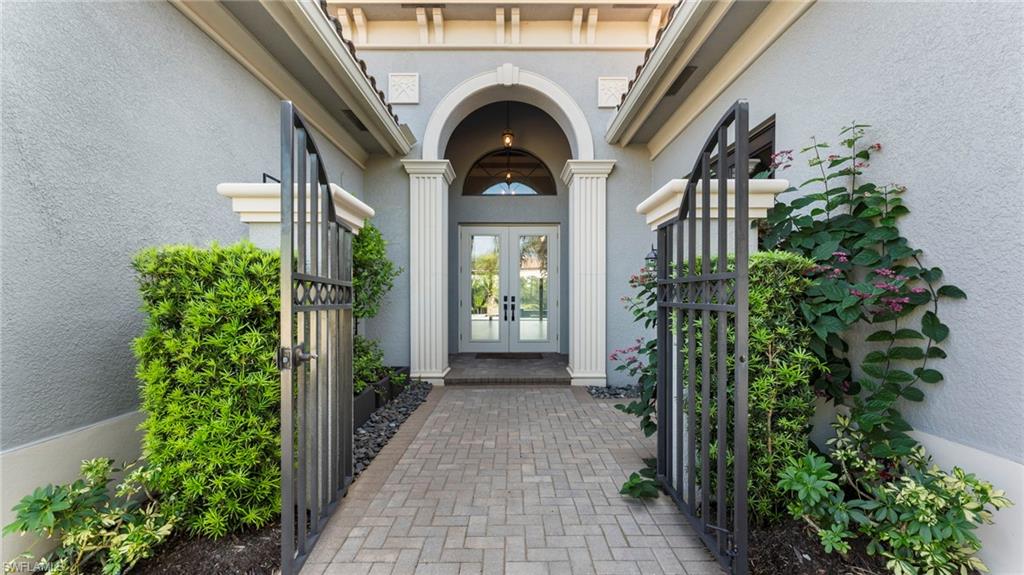 4398 Caldera Circle Naples, FL 34119 - Photo 44 of 50 a view of entryway with garden