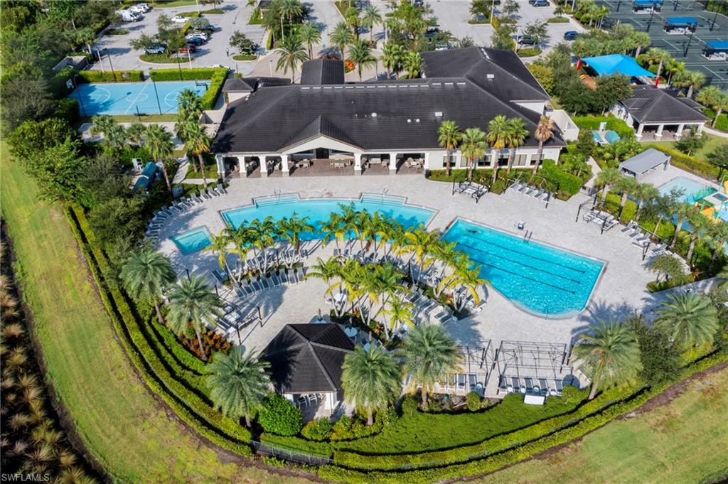 4398 Caldera Circle Naples, FL 34119 - Photo 48 of 50 an aerial view of a house with a swimming pool