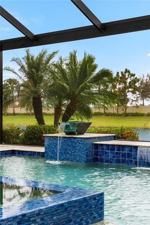 4398 Caldera Circle Naples, FL 34119 - Photo 7 of 50 a view of swimming pool with yard