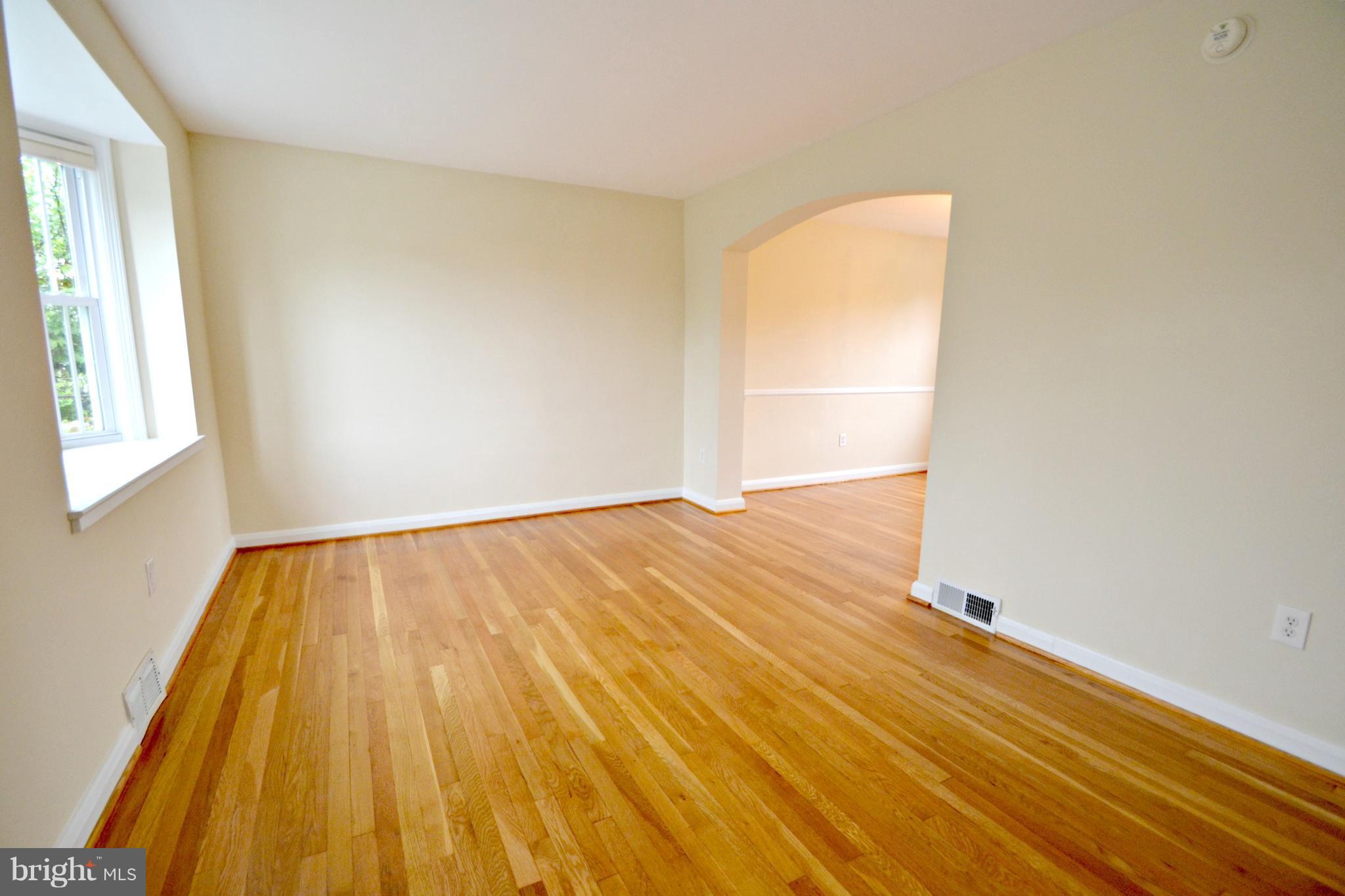 1306 Cedarcroft Road Baltimore, MD 21239 - Photo 3 of 21 wooden floor in a room
