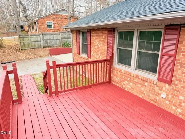 a view of outdoor space with deck and wooden floor