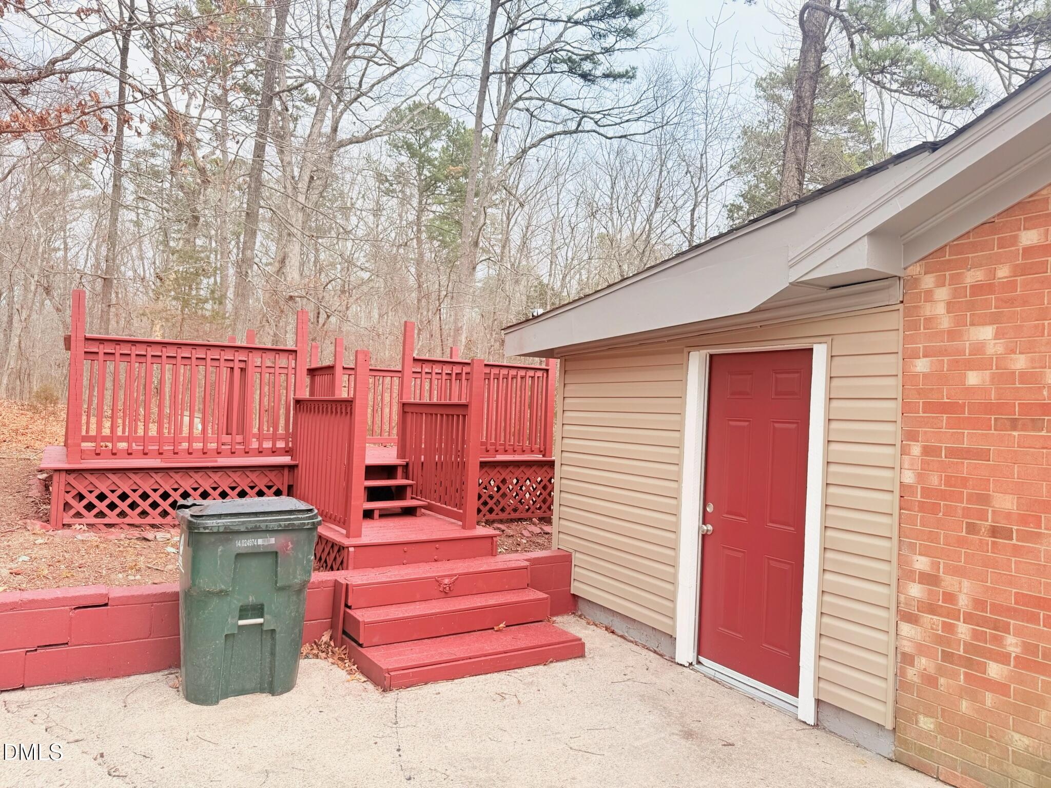 1209 Snow Hill Road Durham, NC 27712 - Photo 13 of 14 a front view of a house with a garden