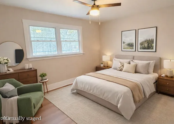 a bedroom with a bed and a couch