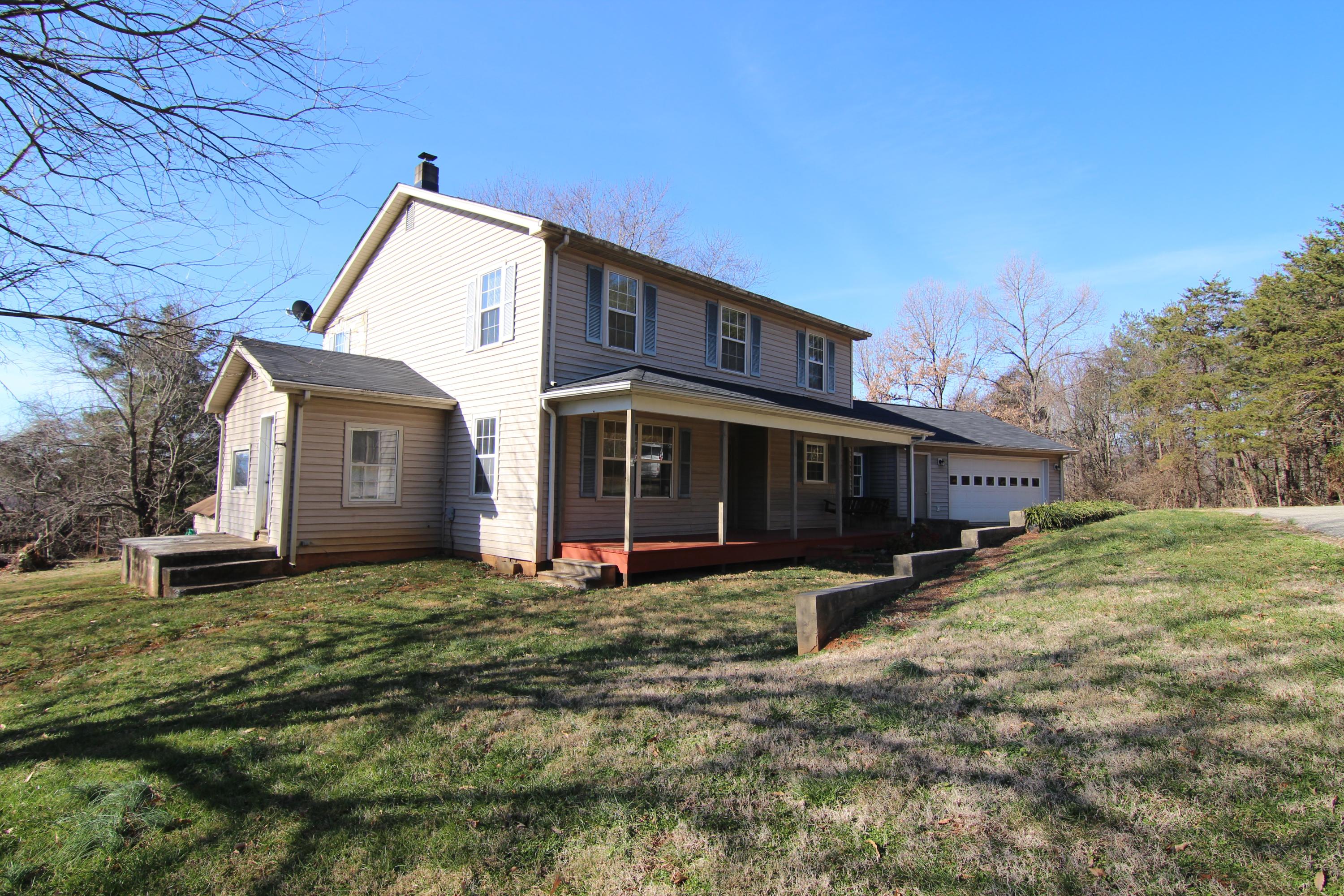 1063 Pep Hill Road Goodview, VA 24095 - Photo 1 of 27 a view of a house with a yard