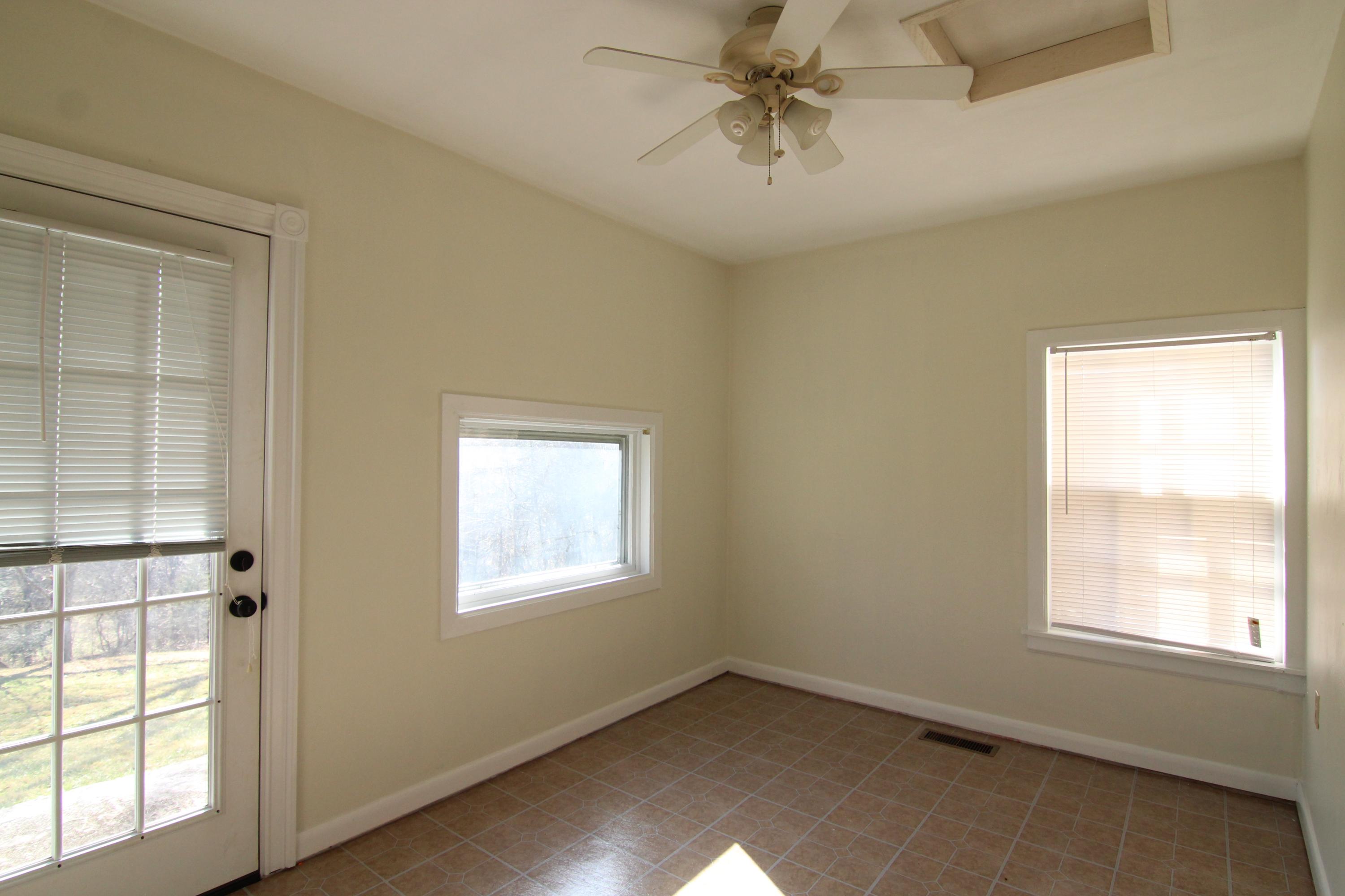 1063 Pep Hill Road Goodview, VA 24095 - Photo 14 of 27 an empty room with a window