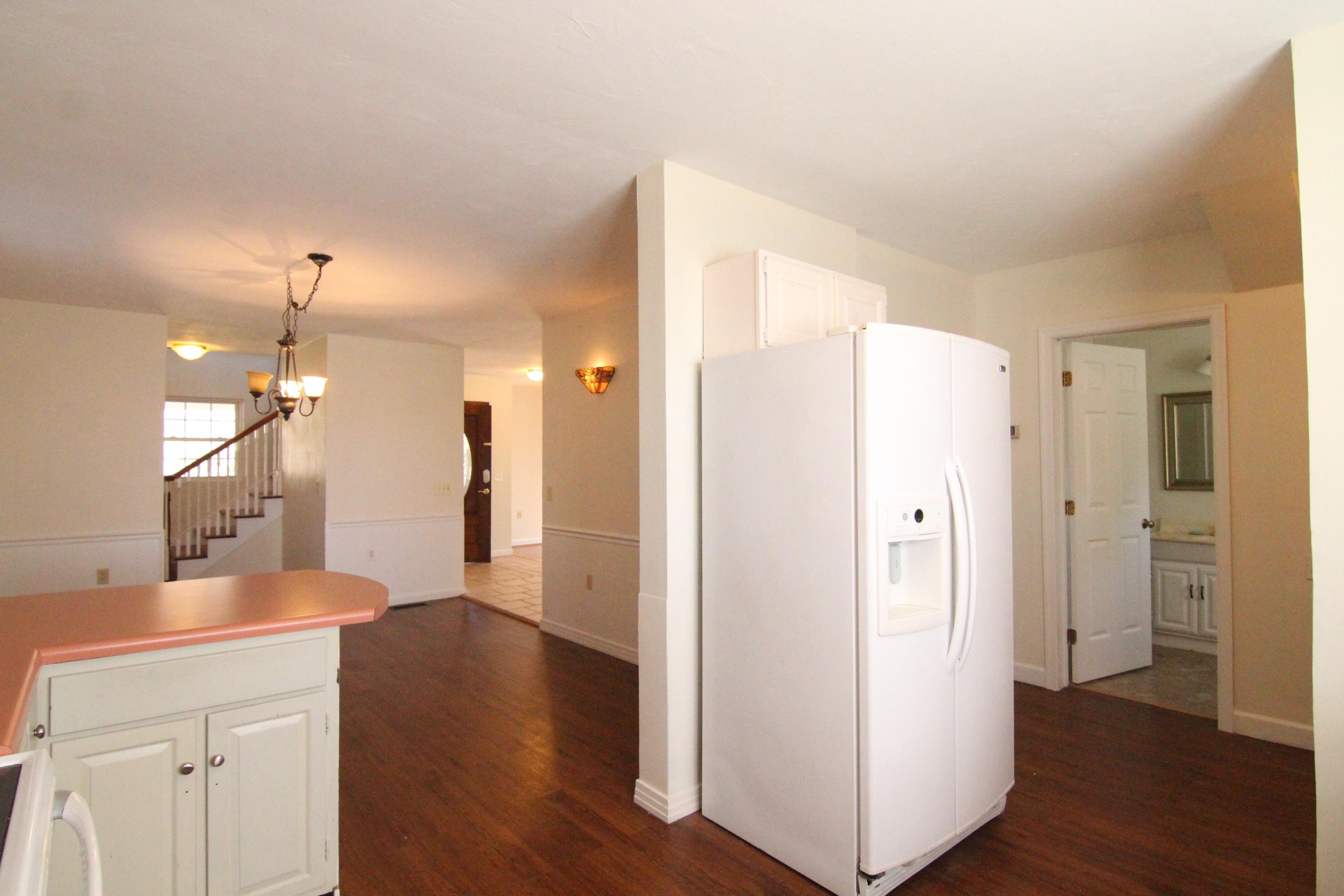 1063 Pep Hill Road Goodview, VA 24095 - Photo 9 of 27 a view of a kitchen cabinets and wooden floor