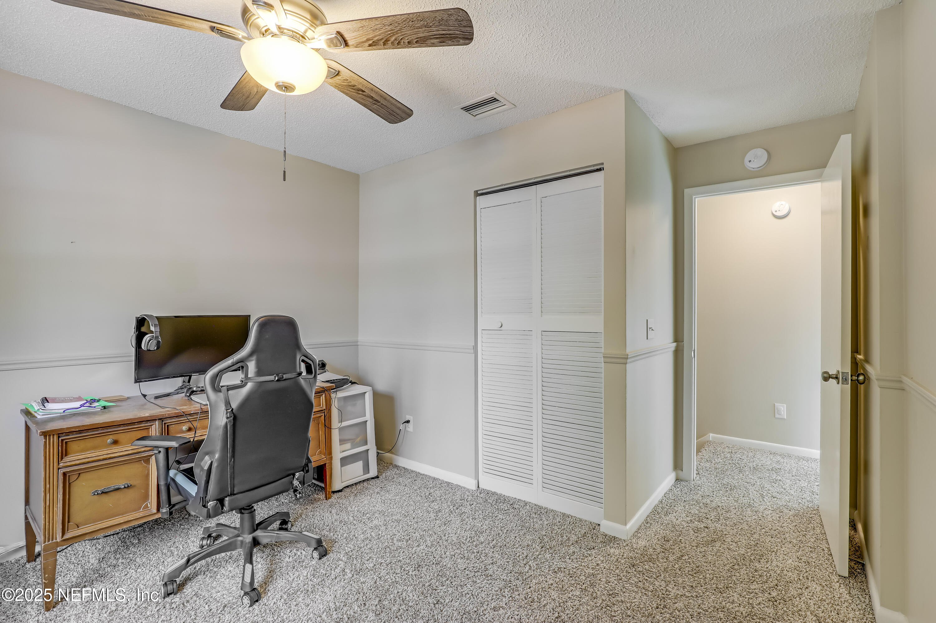 503 Kettering Way Orange Park, FL 32073 - Photo 19 of 28 a view of a workspace with furniture