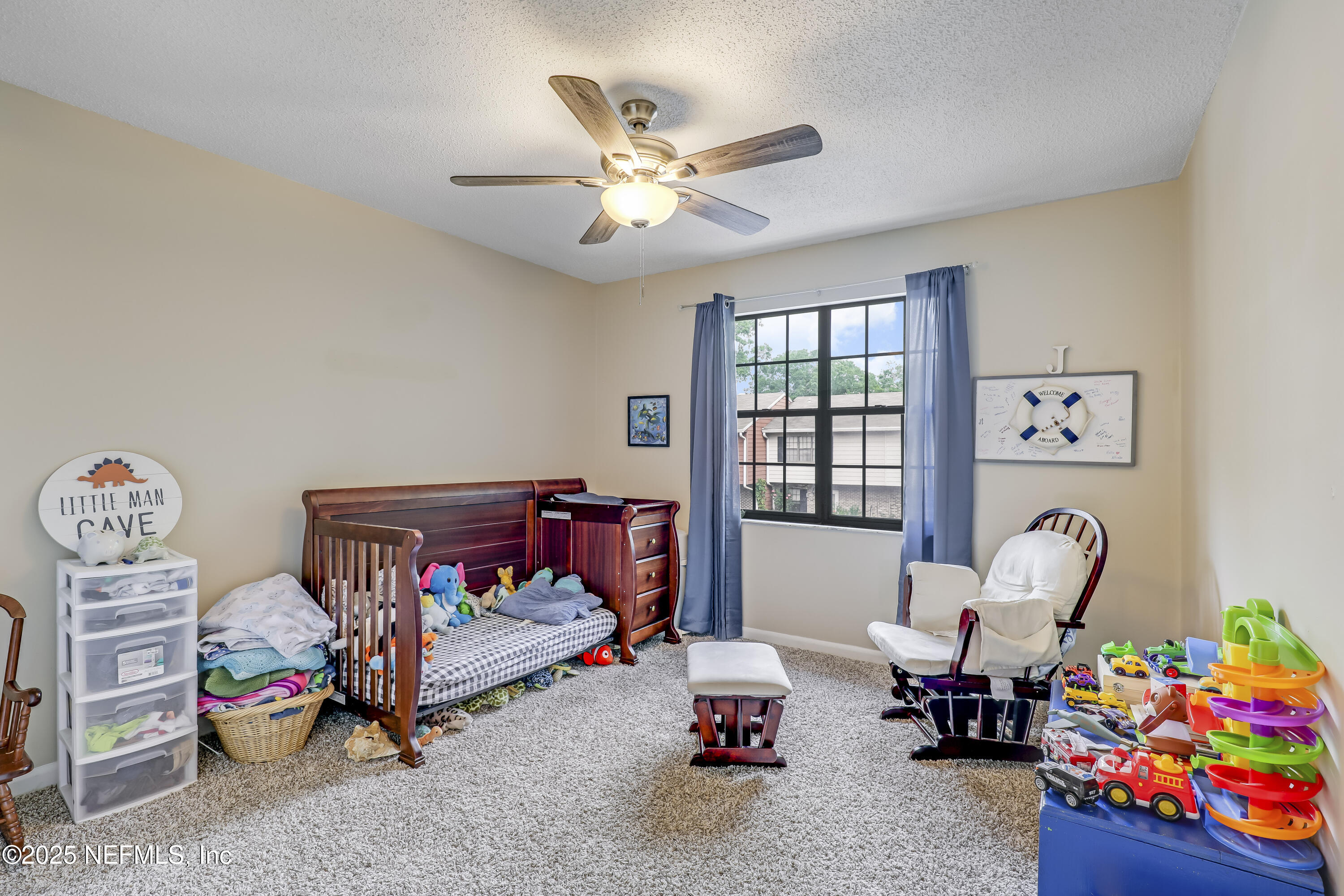 503 Kettering Way Orange Park, FL 32073 - Photo 20 of 28 a bedroom with furniture and a window