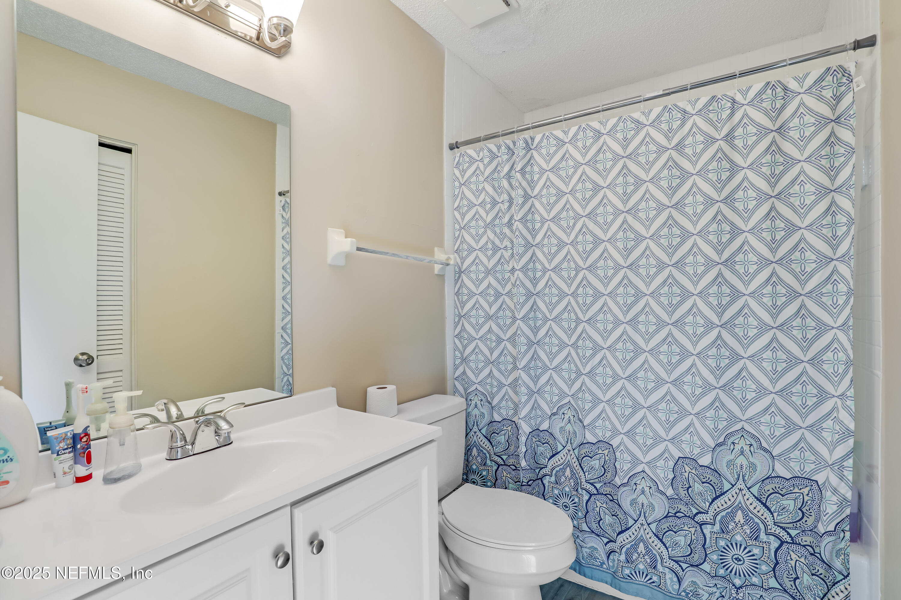 503 Kettering Way Orange Park, FL 32073 - Photo 21 of 28 a bathroom with a sink and a toilet