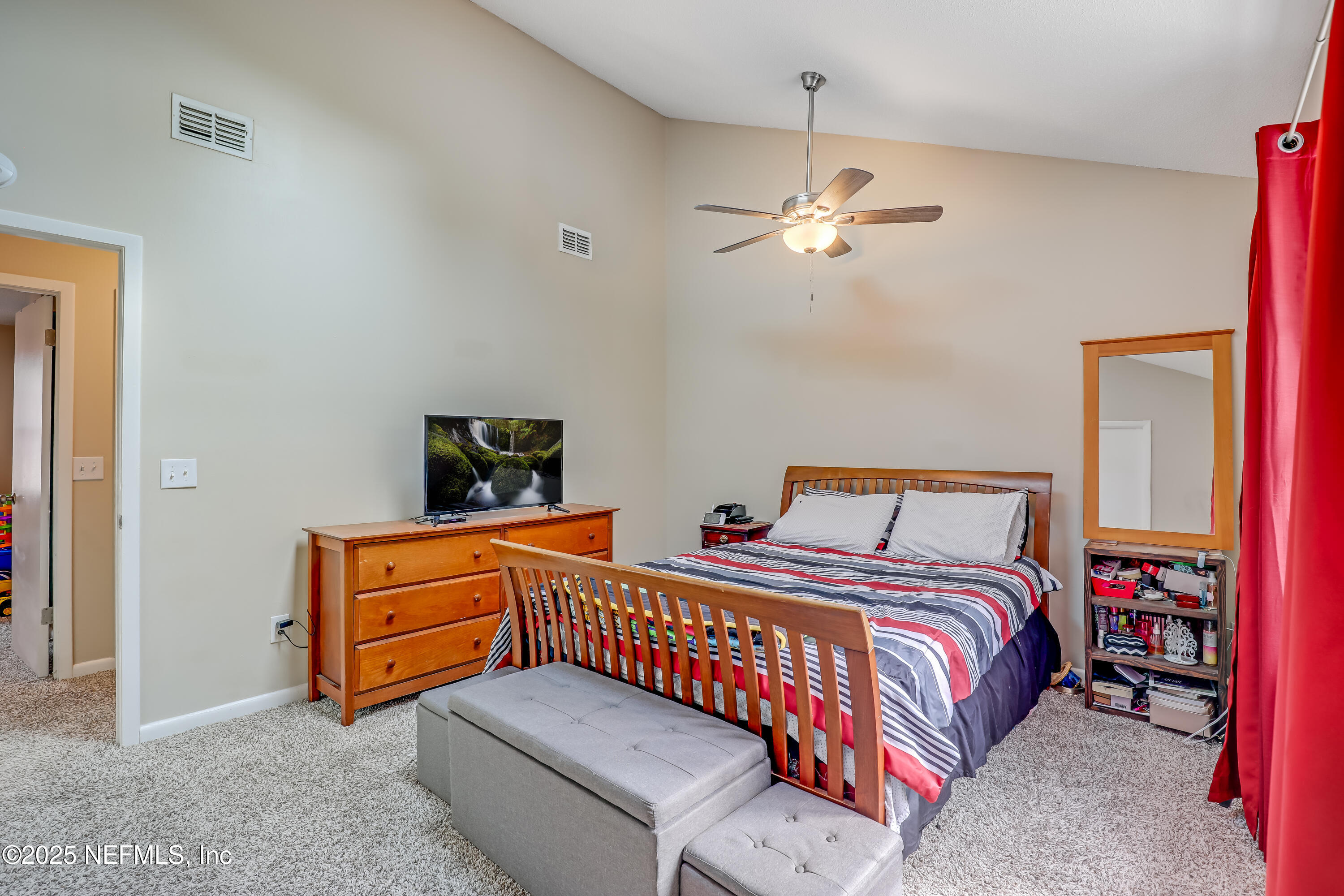 503 Kettering Way Orange Park, FL 32073 - Photo 22 of 28 a bedroom with bed and window