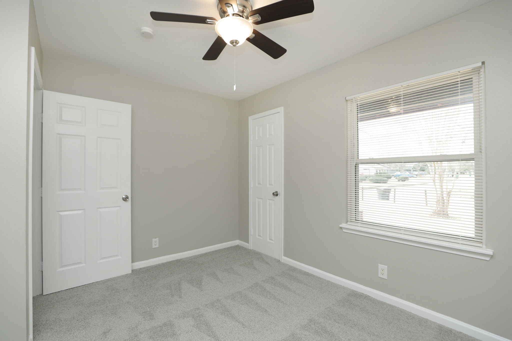 9211 Vinearbor Street Houston, TX 77033 - Photo 25 of 33 a view of an empty room with a window