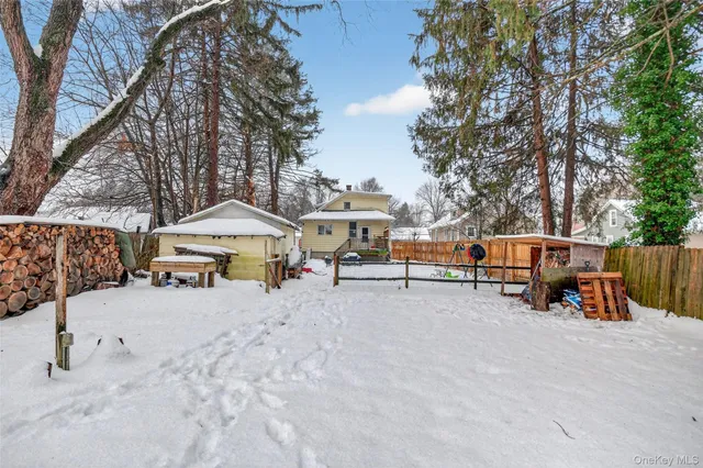 an outdoor space with patio and white umbrellas