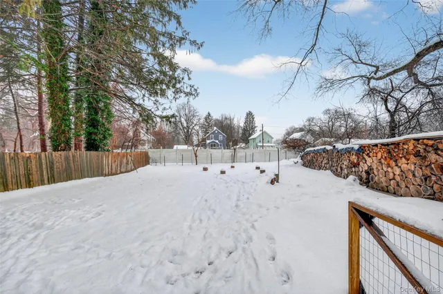 a view of a backyard of the house