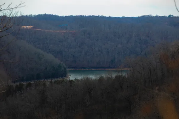 a view of a lake in between of the house