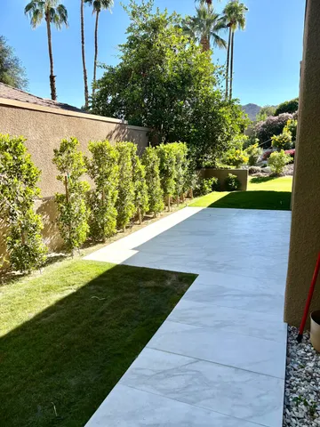 a view of a yard with an outdoor space