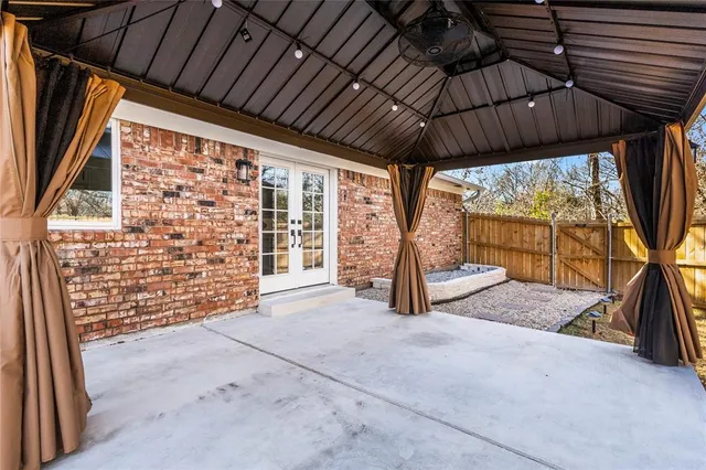 a view of porch with green space