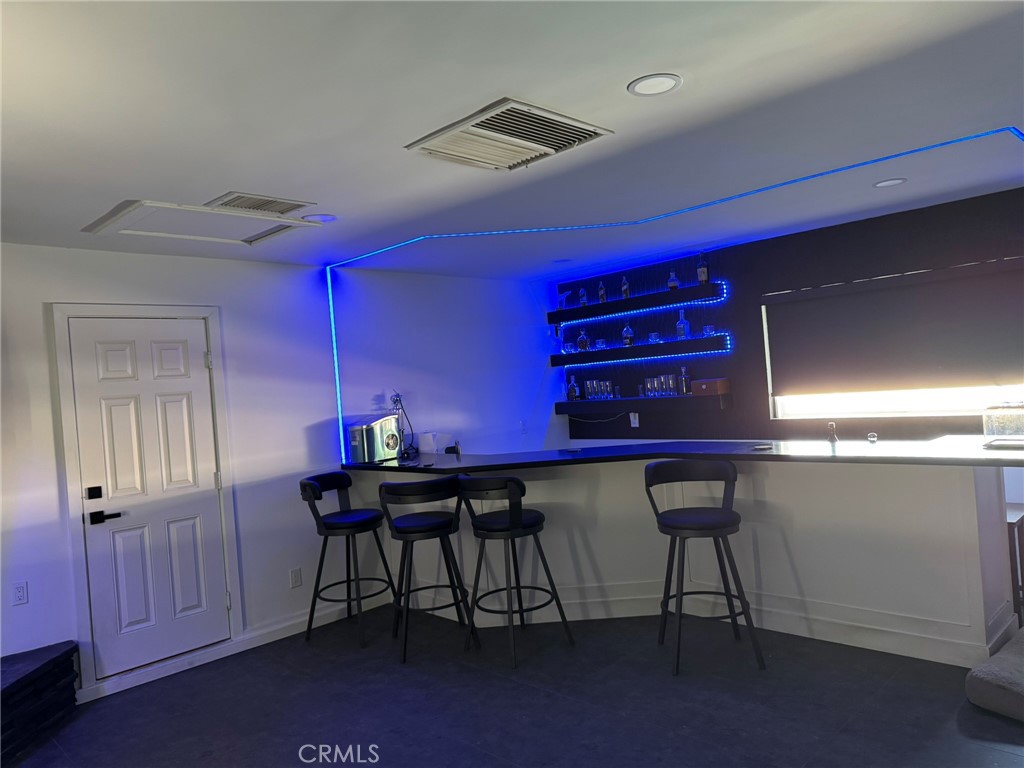 13771 Wawona Road Apple Valley, CA 92307 - Photo 11 of 30 a room with furniture and window