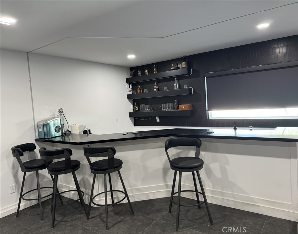 13771 Wawona Road Apple Valley, CA 92307 - Photo 8 of 30 a kitchen with a table and chairs in it