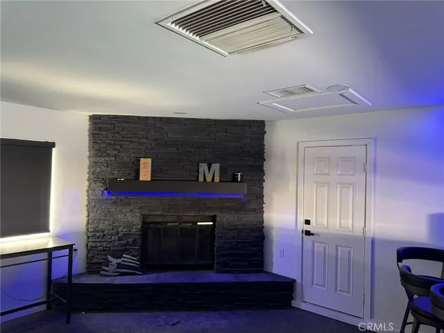 a room with furniture and window