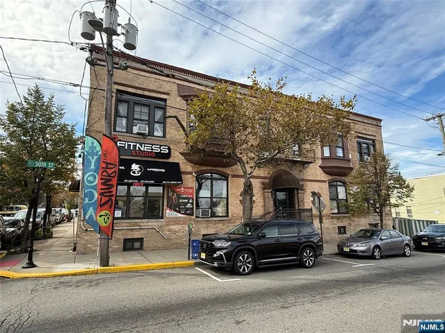 a car parked in front of a building