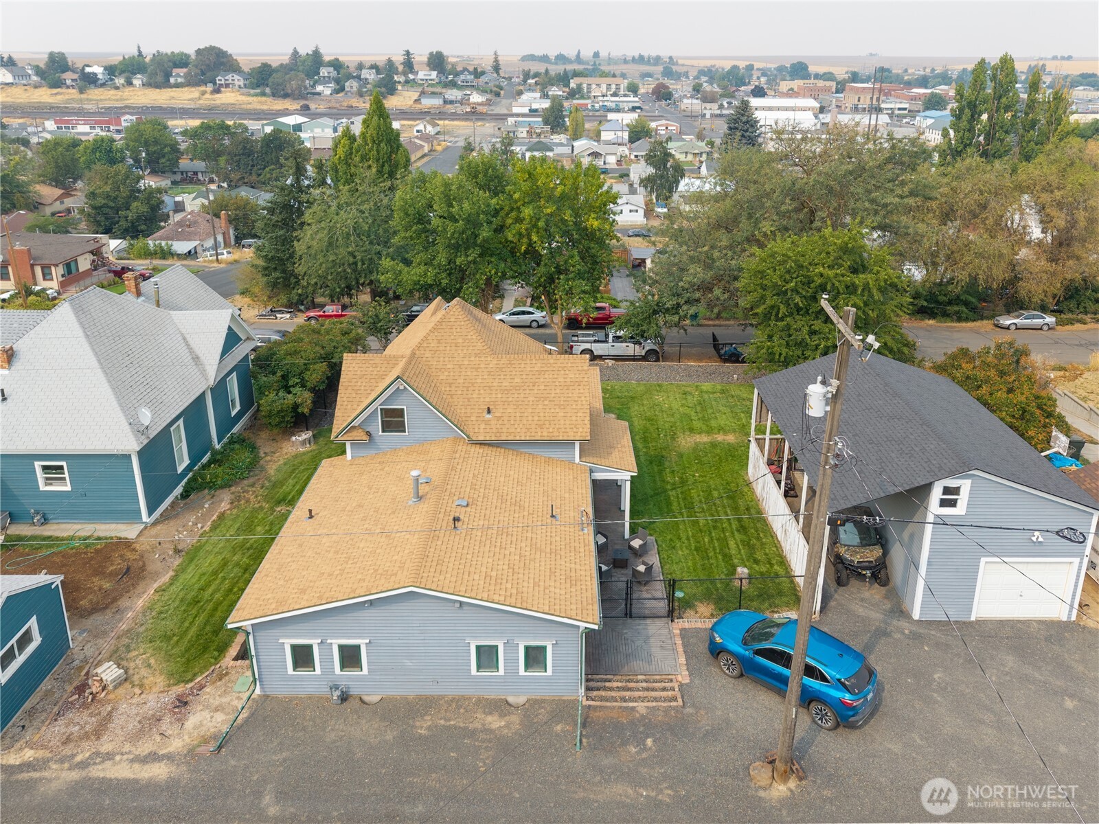 407 West 4th Avenue Ritzville, WA 99169 - Photo 35 of 40 an aerial view of a house with a garden and lake view