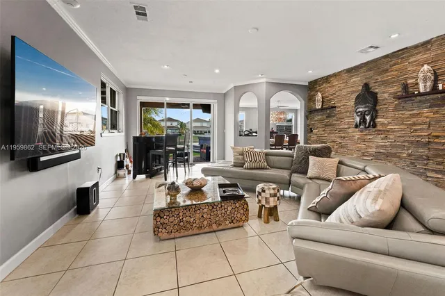 a bathroom with a double vanity sink toilet and shower
