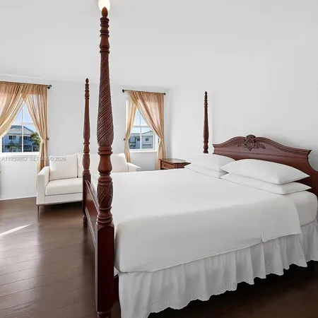 a view of road with large trees