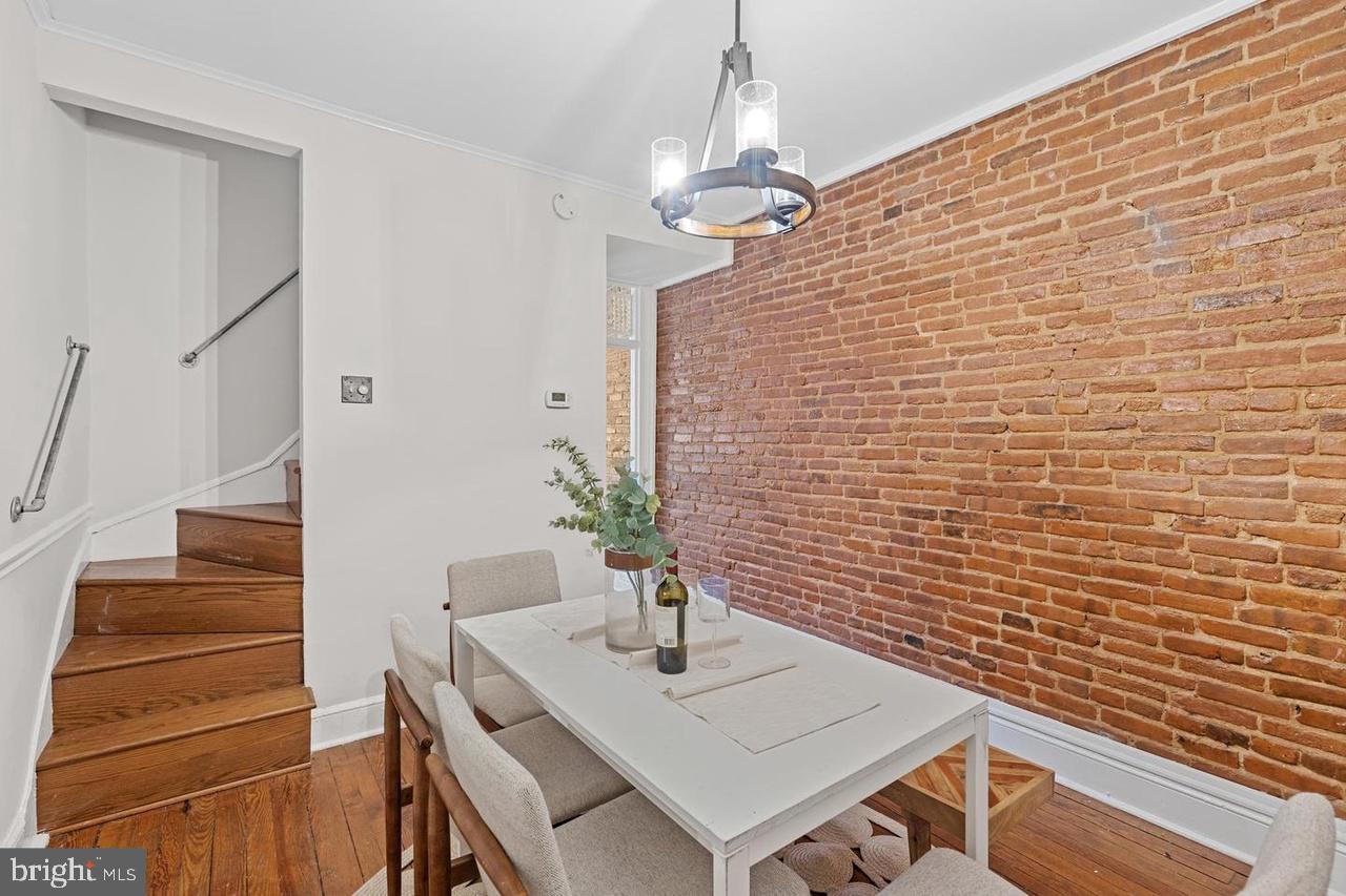 1444 Henry Street Baltimore, MD 21230 - Photo 12 of 18 Charming dining nook with exposed brick.