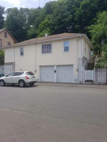 a car parked in front of house