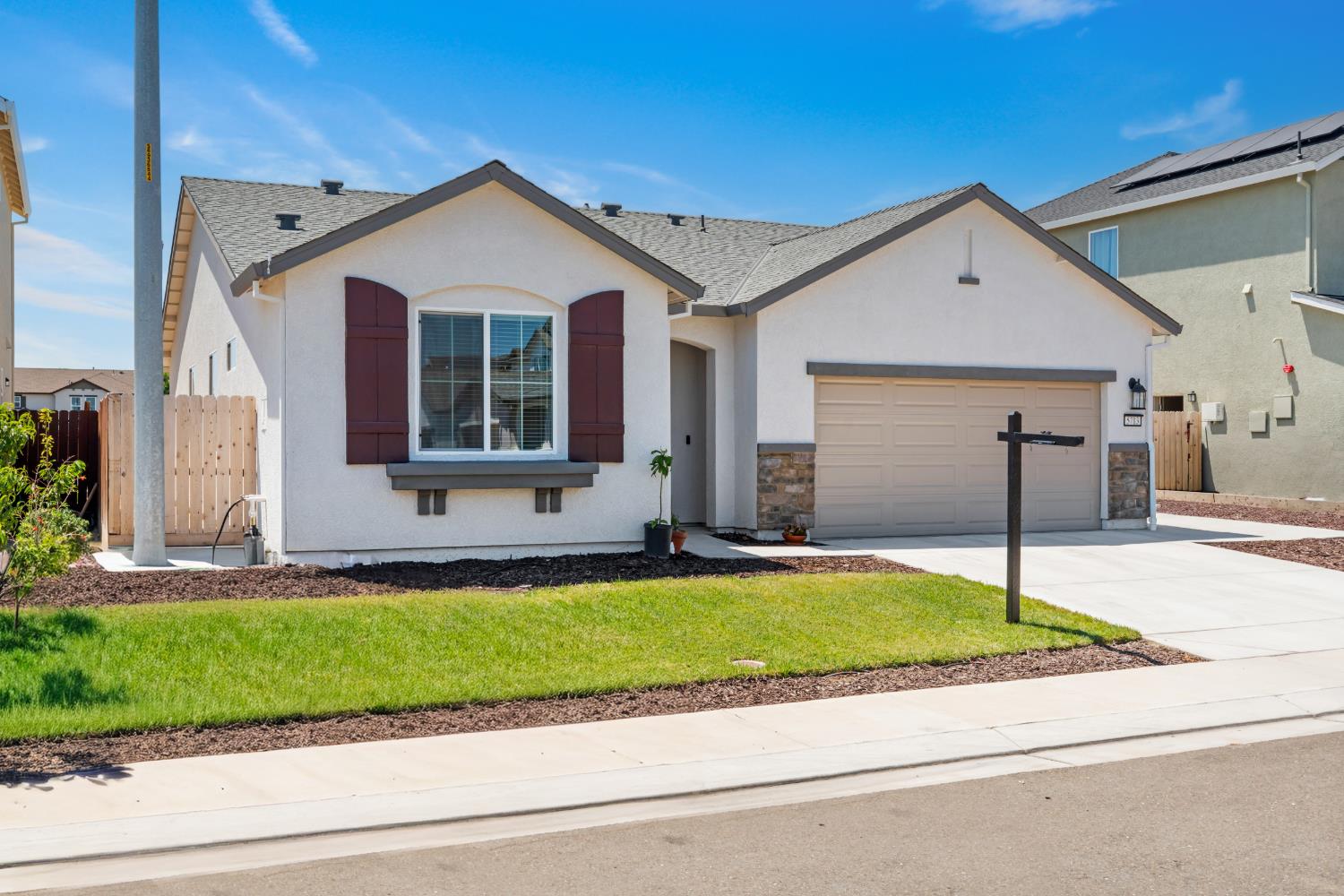 5713 Natalie Way Keyes, CA 95328 - Photo 2 of 30 a view of a house with a swimming pool and a yard
