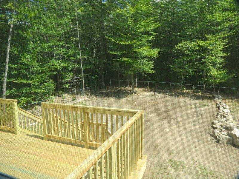 450 Cape Monday Road Harrison, ME 04040 - Photo 24 of 32 Exterior Back. New deck in backyard