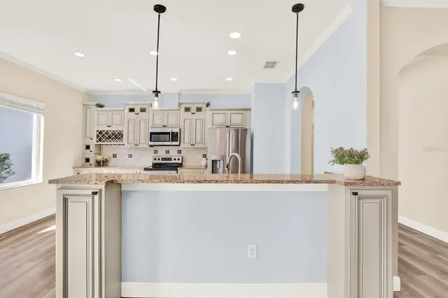 a bathroom with a double vanity sink toilet mirror and bathtub