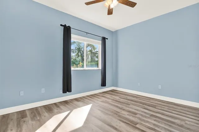 a view of outdoor space with trees all around