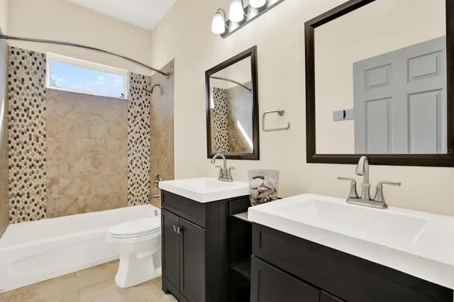 a view of field with trees in the background