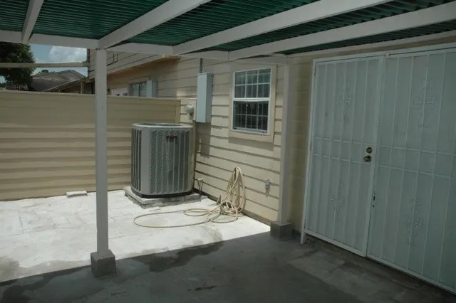 a view of a porch with a door