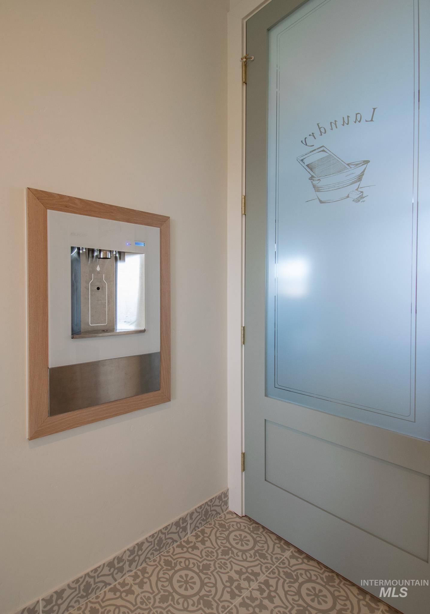 44 Big Moose Road McCall, ID 83638 - Photo 39 of 50 Built-in water dispenser with a natural wood-finish frame