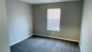 an empty room with a window