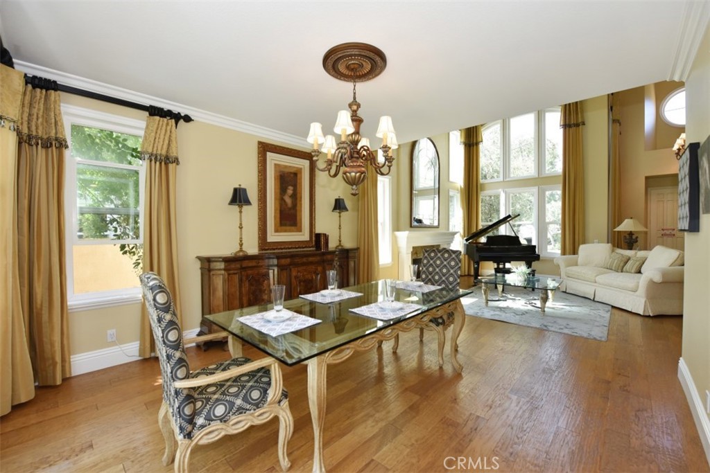 12 Brigadier Irvine, CA 92603 - Photo 16 of 50 a view of a dining room with furniture and wooden floor