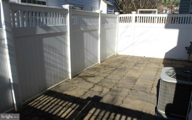 9878 Dochart Sound Lane Bristow, VA 20136 - Photo 28 of 30 a balcony with a bench