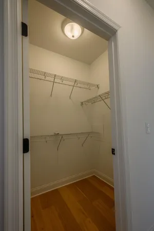 a view of a room with racks on the wall