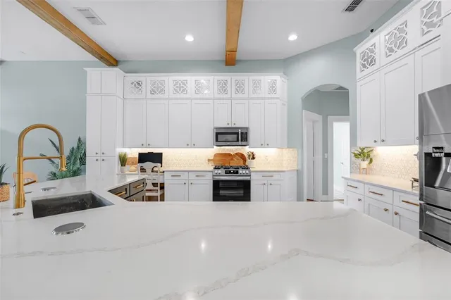 a view of a dining room with furniture