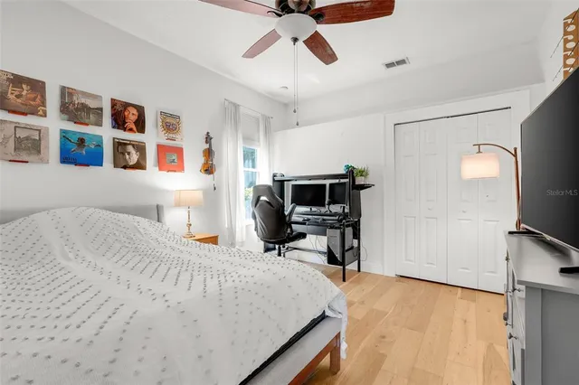 a workspace with furniture and a potted plant