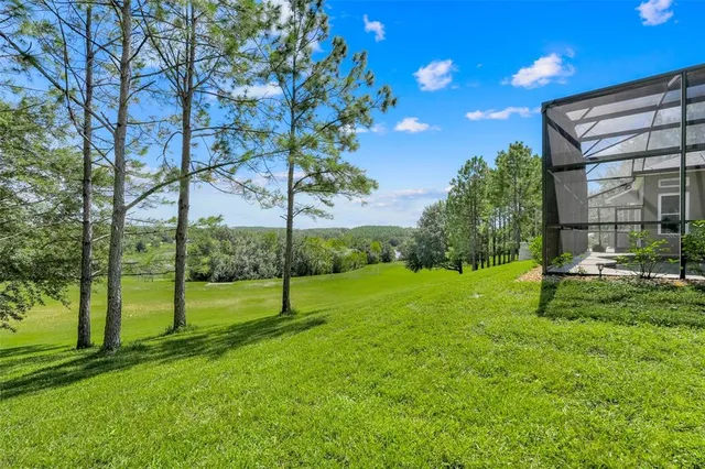 a view of a house with a big yard