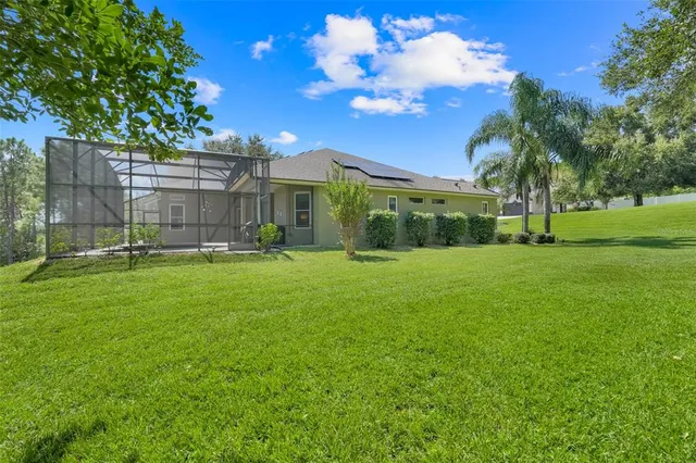 a view of a backyard with a garden