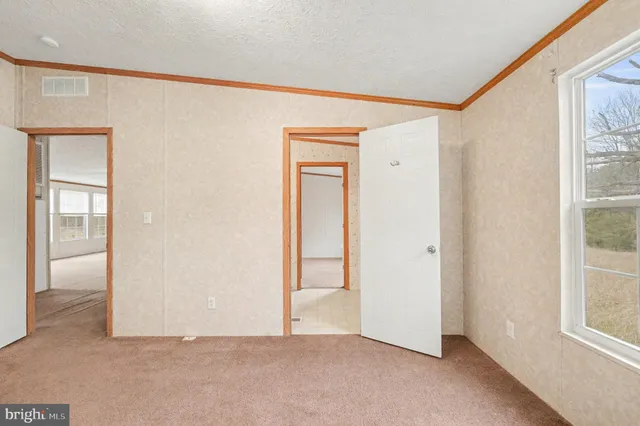 an empty room with windows