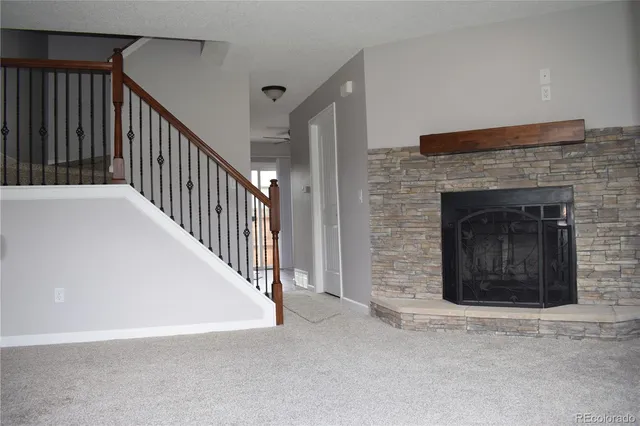 a view of a livingroom with a fireplace