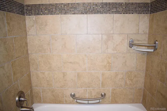 a bathroom with a sink and a shower