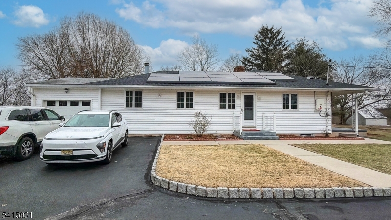 168 Line Road West Windsor, NJ 08550 - Photo 3 of 19 a front view of a house with cars parked