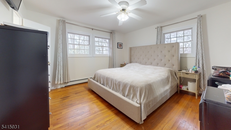 168 Line Road West Windsor, NJ 08550 - Photo 10 of 19 a large bed sitting in a bedroom next to a window