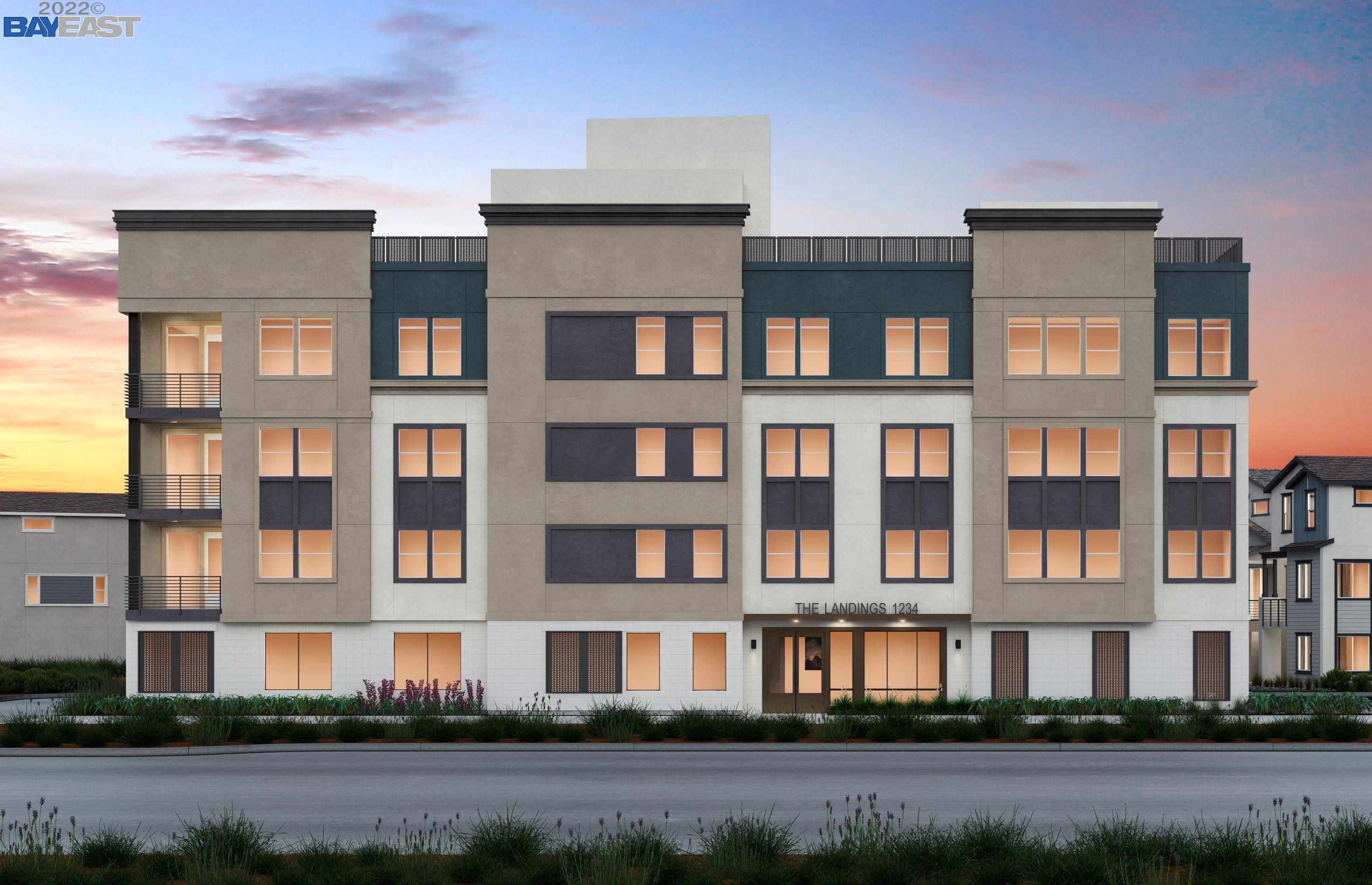 a front view of residential houses with street